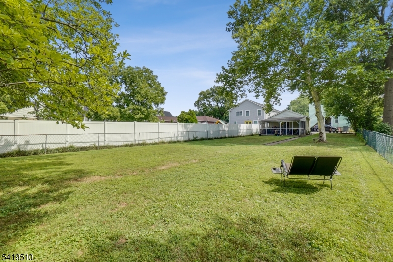 68 North Street, Unit 2 Madison, NJ 07940 - Photo 17 of 18 a view of a garden with swimming pool