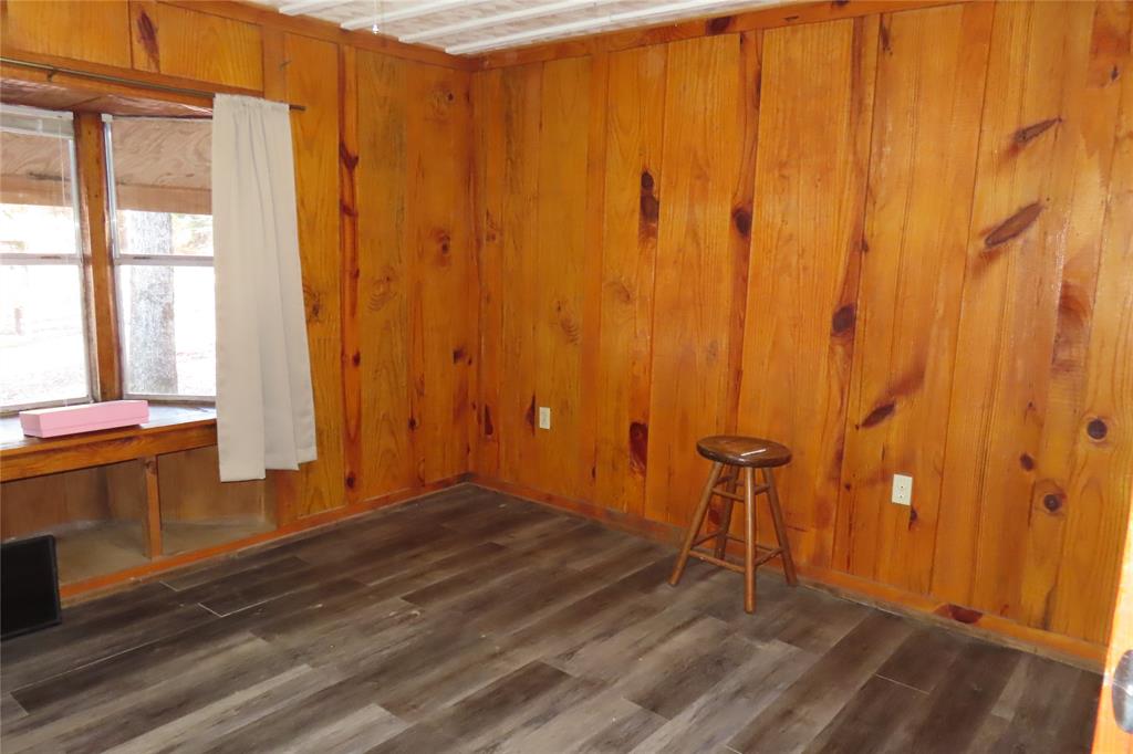 99 Lafayette 215 Road Taylor, AR 71861 - Photo 10 of 18 a view of a room with wooden walls