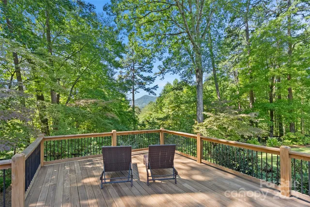 a view of a chair and table on the wooden floor