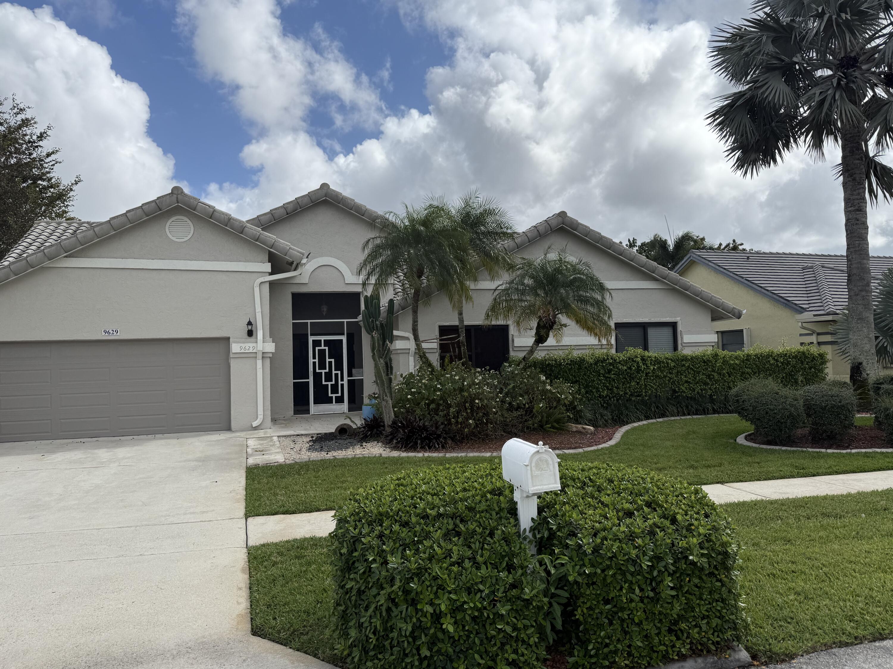 9629 El Clair Ranch Road Boynton Beach, FL 33437 - Photo 1 of 24 the front of the home 2