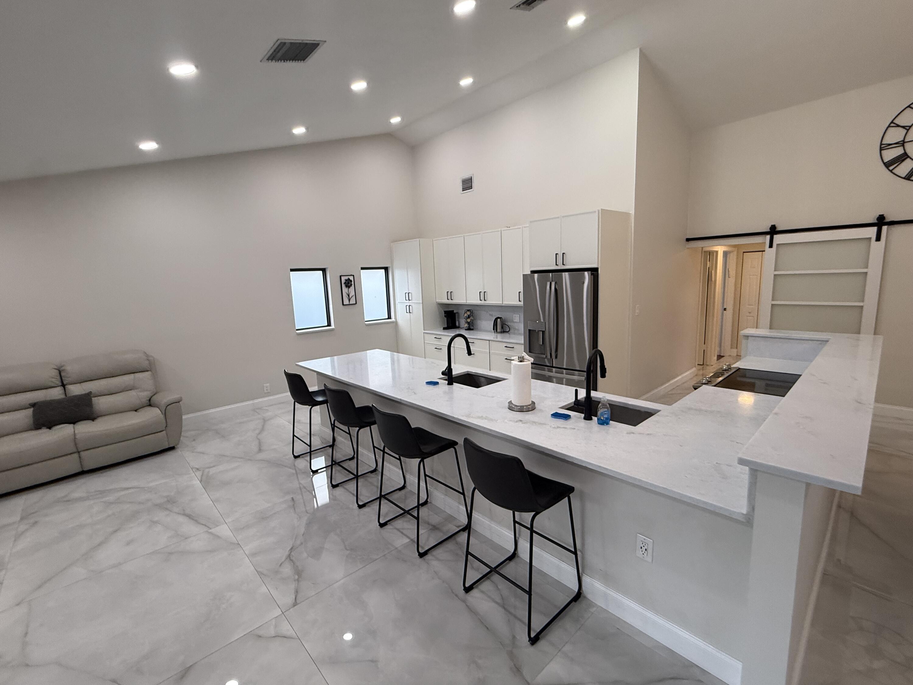 9629 El Clair Ranch Road Boynton Beach, FL 33437 - Photo 5 of 24 the kitchen
