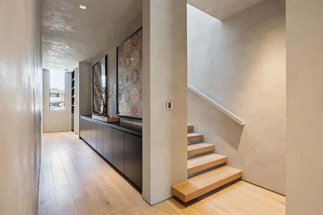 a view of a hallway with staircase