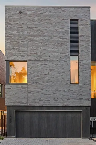 a brick house with a door