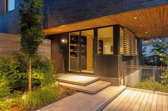 a balcony view with a seating space