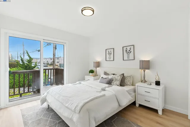 a bedroom with a bed and a shower