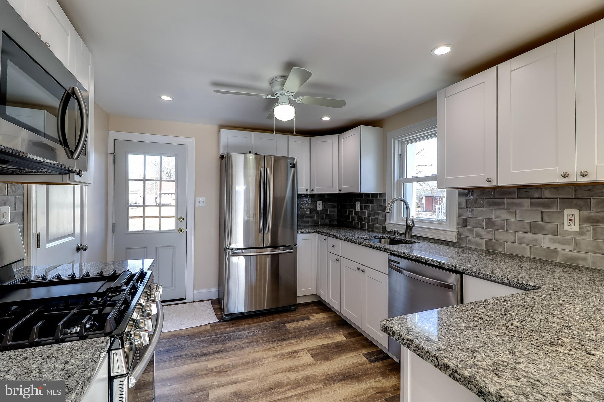 323 Homberg Avenue Baltimore, MD 21221 - Photo 2 of 30 New Kitchen w/ Granite Counters, Ceiling Fan