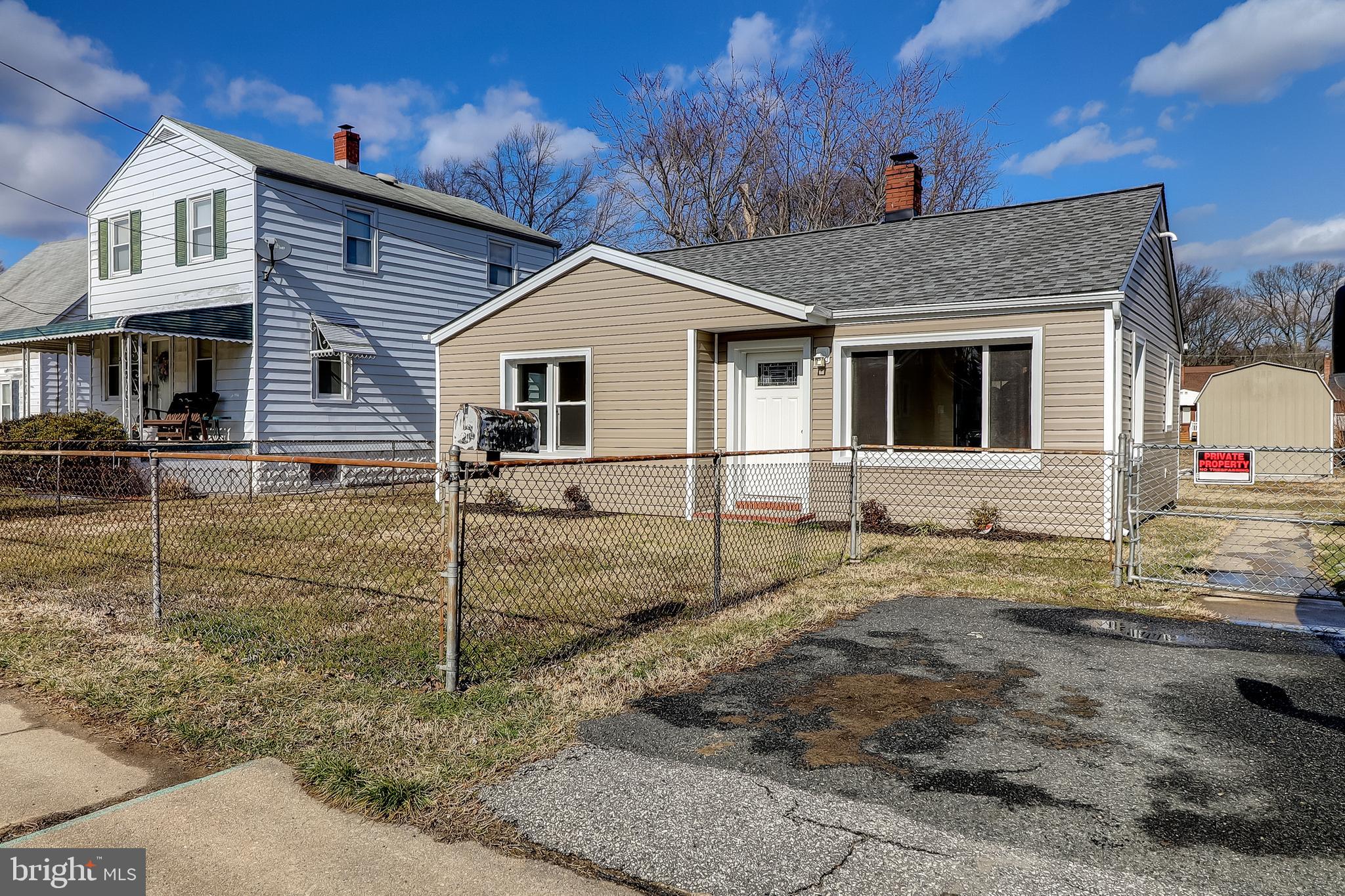 323 Homberg Avenue Baltimore, MD 21221 - Photo 23 of 30 Front View of 323 Homberg Ave w/ new Flower Beds