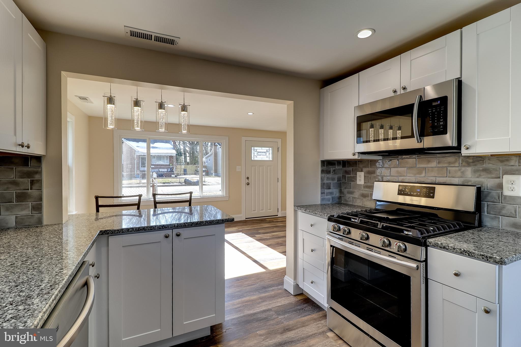 323 Homberg Avenue Baltimore, MD 21221 - Photo 7 of 30 New Kitchen Cabinets offer great storage