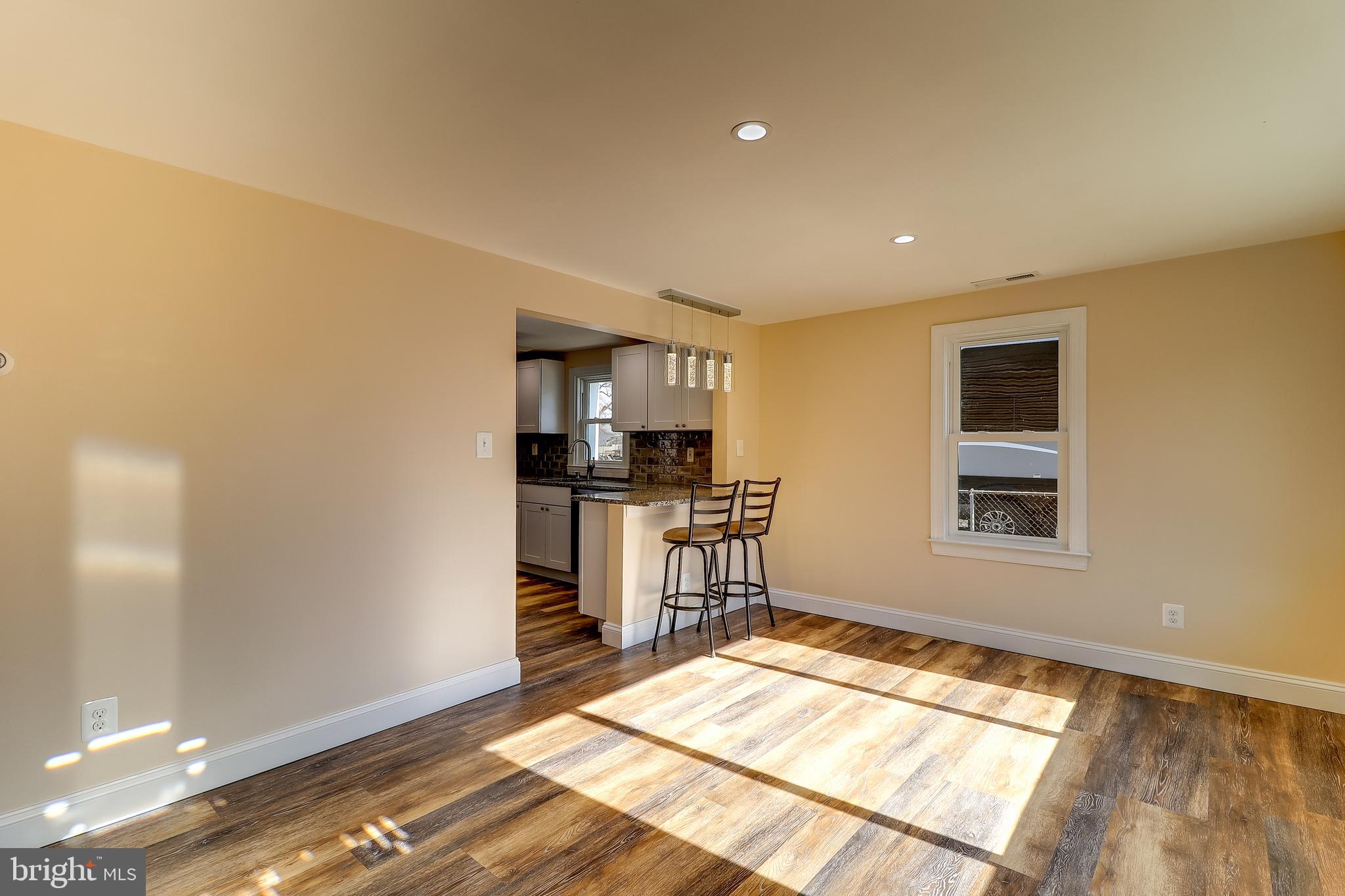 323 Homberg Avenue Baltimore, MD 21221 - Photo 10 of 30 Living Room with New flooring & Recessed Lighting