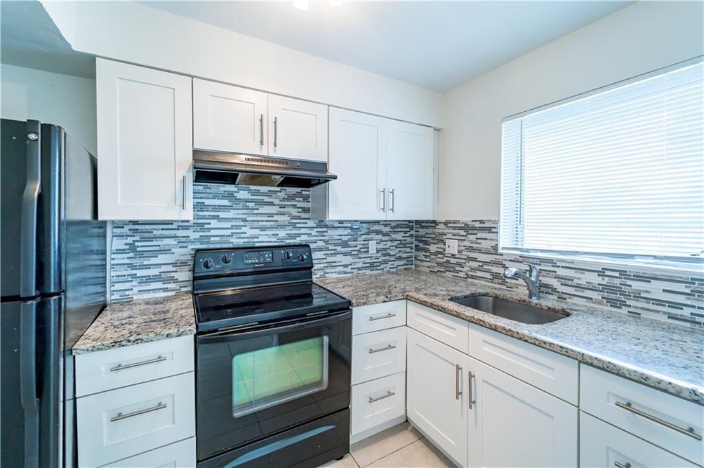 1251 West River Drive, Unit 8 Margate, FL 33063 - Photo 1 of 8 kitchen