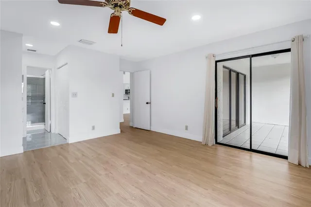 a view of an empty room and window