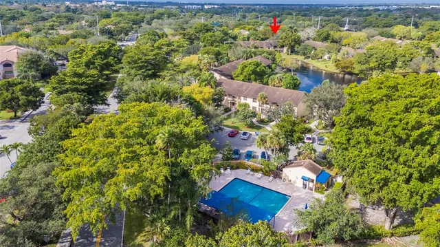 a white toilet sitting next to a bath tub