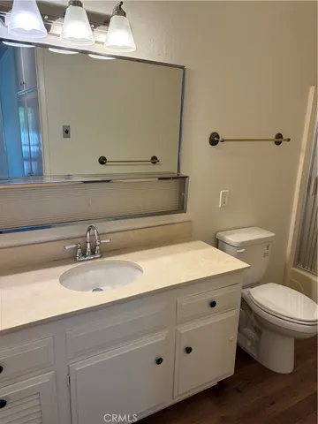 a bathroom with a sink and a toilet