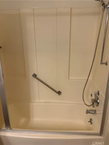 a bathroom with a sink and vanity