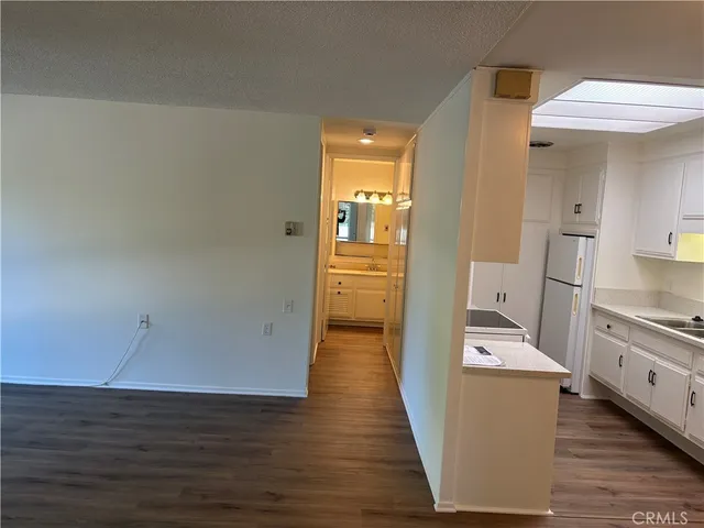 a view of gallery with wooden floor