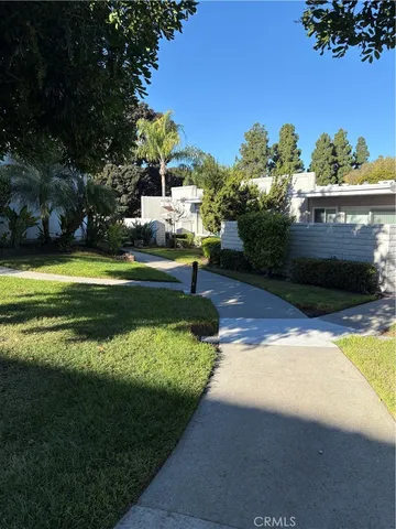 a view of a terrace with a yard