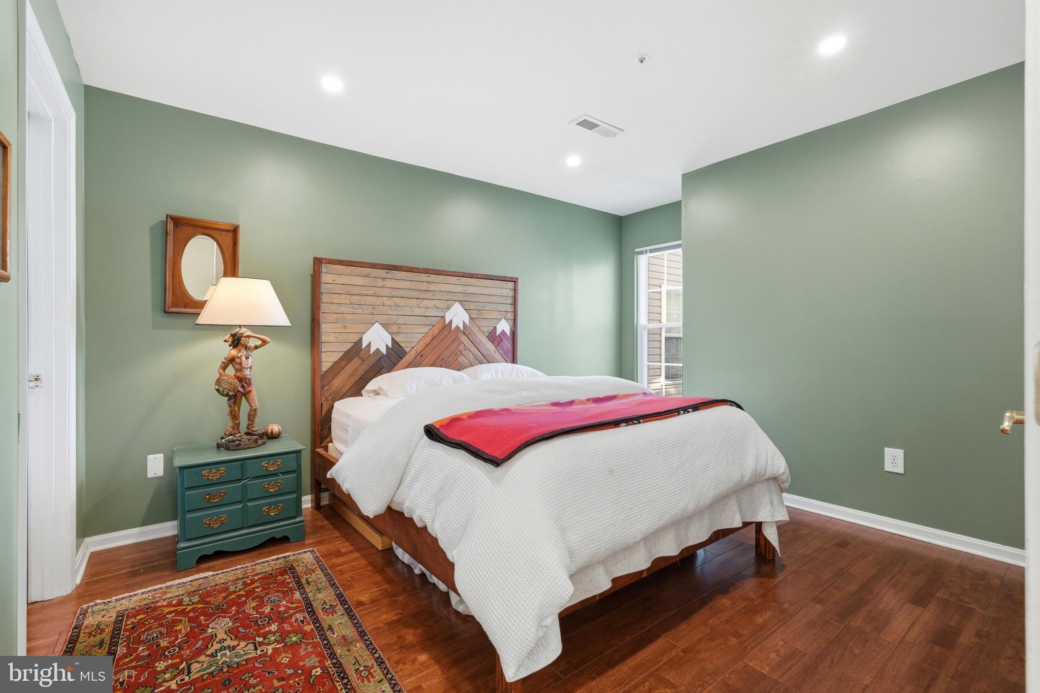 13513 Giant Court Germantown, MD 20874 - Photo 18 of 37 a bedroom with a bed and a lamp