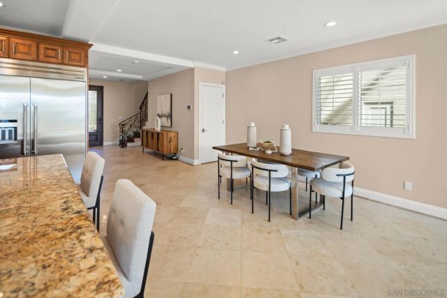 a dining room with furniture and a table