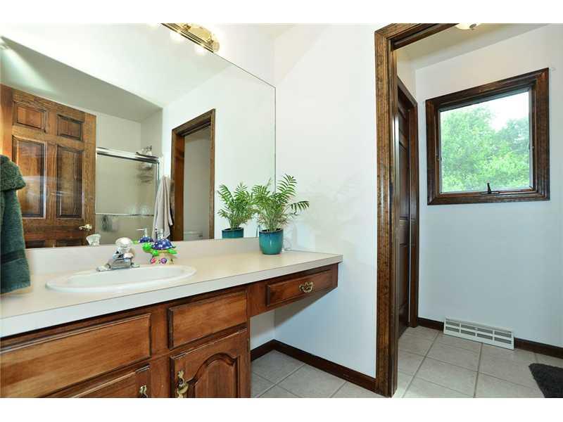 415 Pinkerton Road Wexford, PA 15090 - Photo 18 of 21 Full Bath. Spacious full bath with ceramic tile floor, linen closet and pocket door access to toilet.