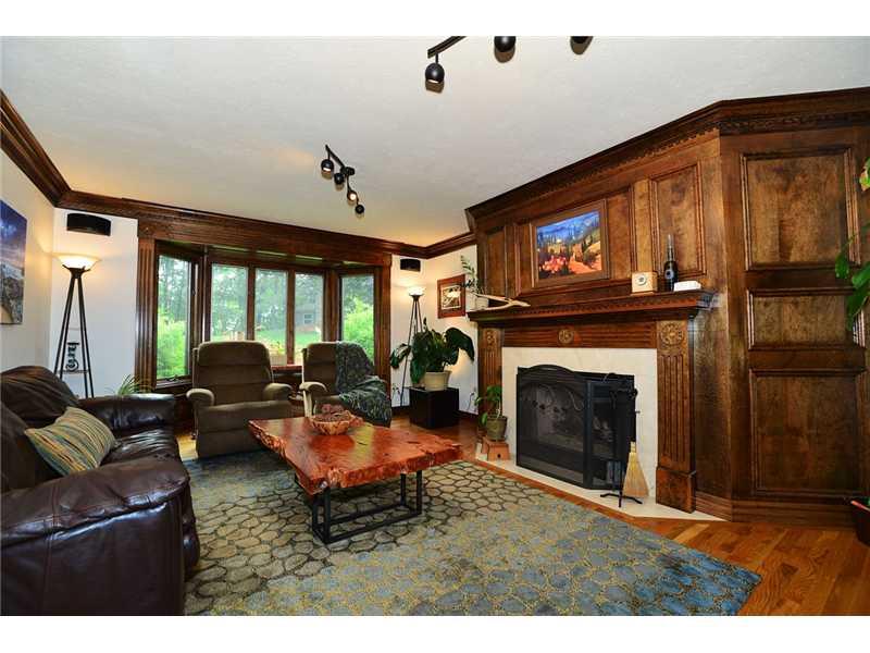 415 Pinkerton Road Wexford, PA 15090 - Photo 6 of 21 Family Room. Cozy family room with majestic fireplace; surrounded in judges paneling and marble. Beautiful wood work including crown molding! Refinished hardwood floors, and bay window overlooks backyard. Adjacent to wet bar.