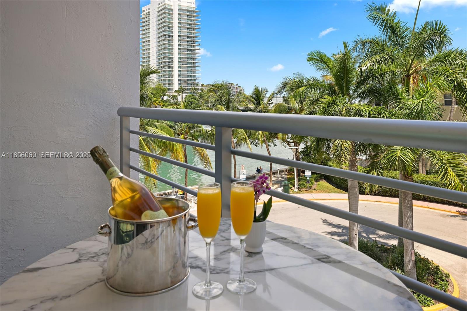 1450 Lincoln Road, Unit 403 Miami Beach, FL 33139 - Photo 1 of 29 a view of a balcony with chairs