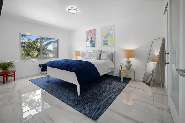 a bathroom with a sink a toilet a shower and a mirror