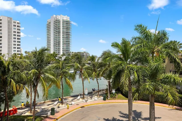 a view of a city with tall buildings