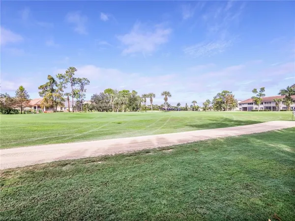 front view of a building with a yard