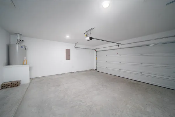 an empty room with an empty space and wooden floor