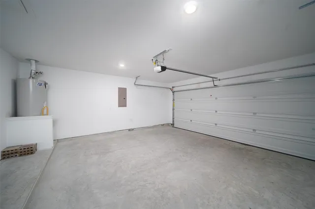 an empty room with an empty space and wooden floor