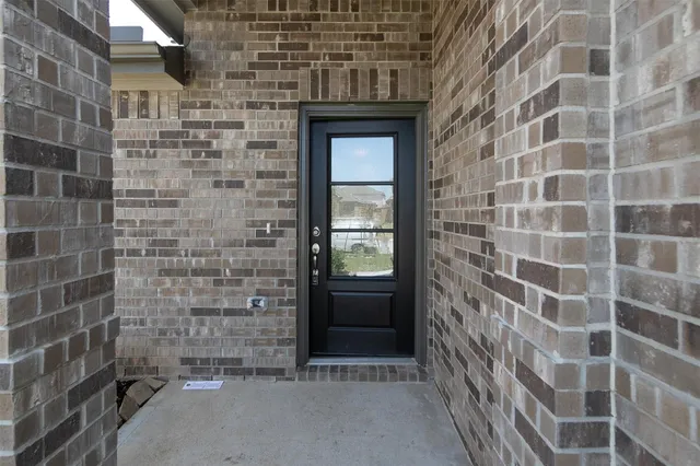 a front view of a house with a window