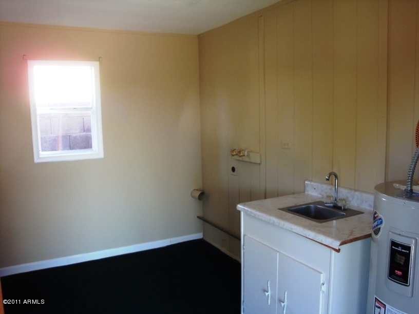 3474 East Hearn Road Phoenix, AZ 85032 - Photo 9 of 10 Laundry/Hobby Room