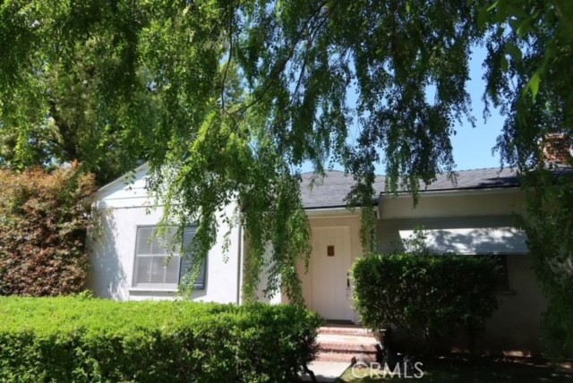 471 Woodward Boulevard Pasadena, CA 91107 - Photo 23 of 30 a view of a house with a tree in a yard
