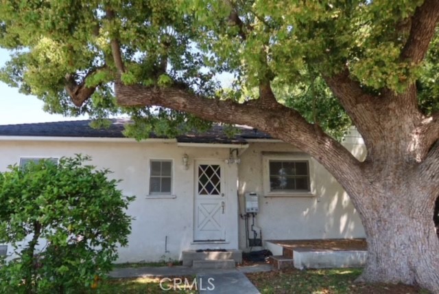471 Woodward Boulevard Pasadena, CA 91107 - Photo 25 of 30 a view of house with tree in front of it