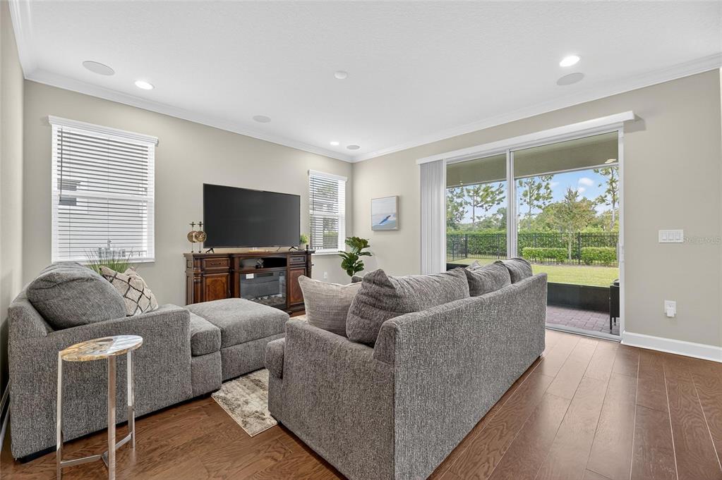5534 Silver Sun Drive Apollo Beach, FL 33572 - Photo 15 of 76 a living room with furniture and a flat screen tv