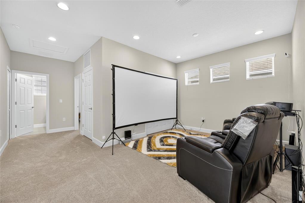 5534 Silver Sun Drive Apollo Beach, FL 33572 - Photo 22 of 76 a room with furniture and air hockey table