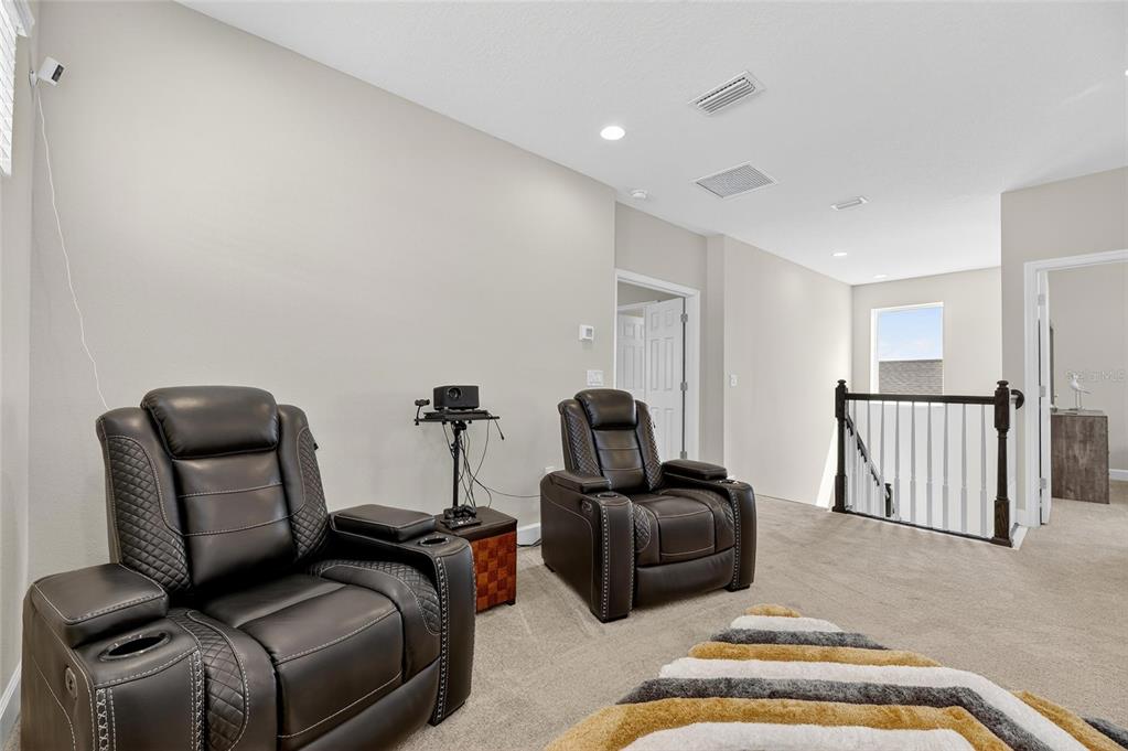 5534 Silver Sun Drive Apollo Beach, FL 33572 - Photo 24 of 76 a living room with furniture and a rug