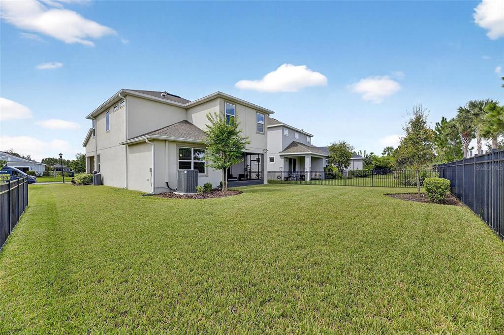 5534 Silver Sun Drive Apollo Beach, FL 33572 - Photo 45 of 76 a house view with a garden space