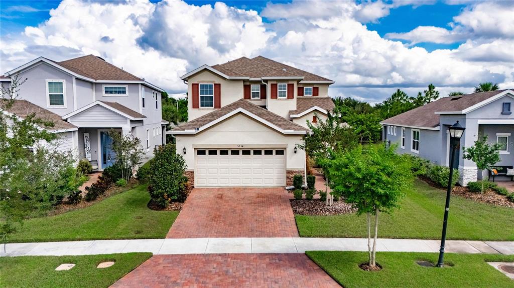 5534 Silver Sun Drive Apollo Beach, FL 33572 - Photo 49 of 76 a front view of a house with a yard