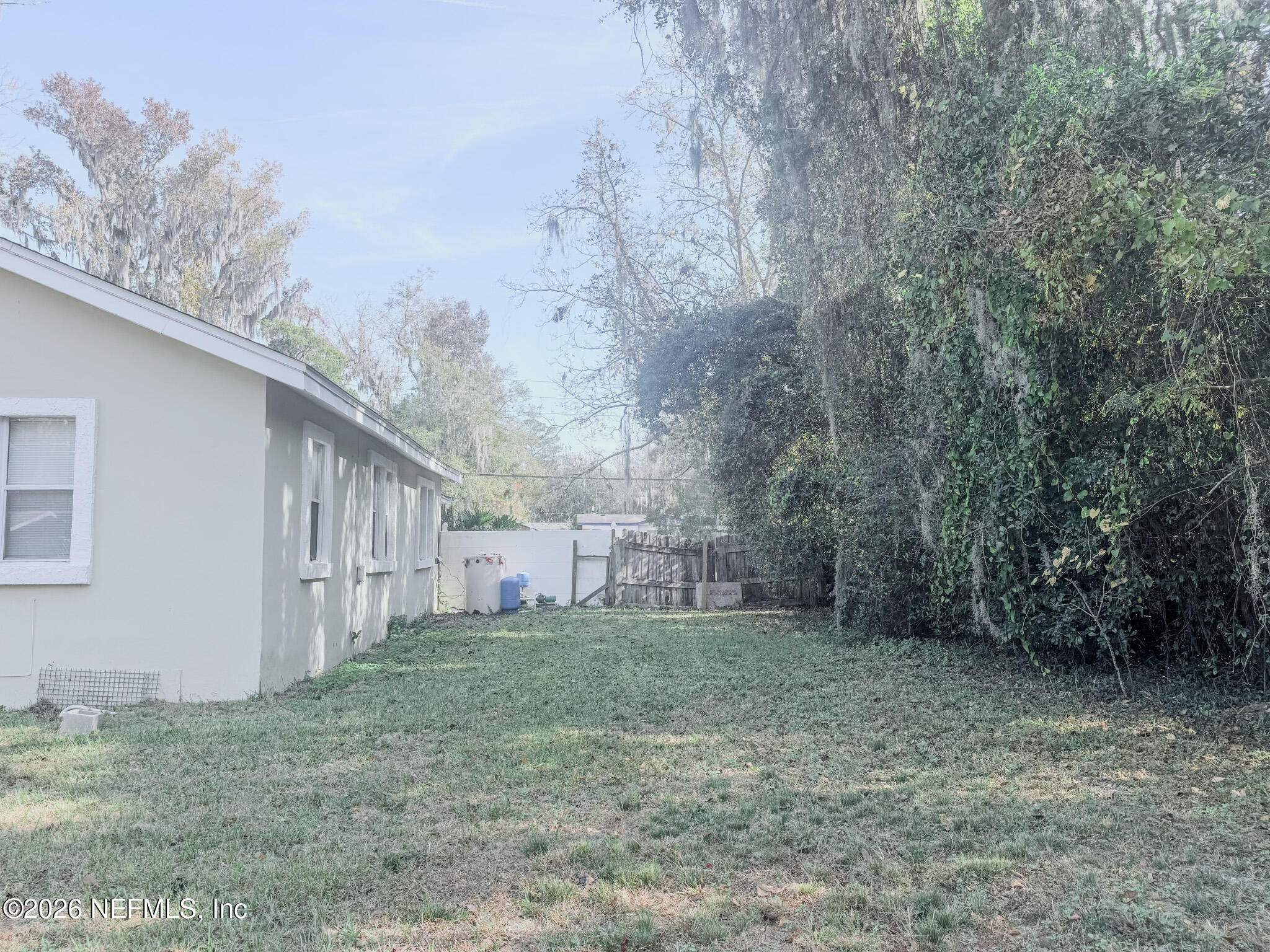 10728 Old Kings Road Jacksonville, FL 32219 - Photo 12 of 21 a view of a yard in front of a house