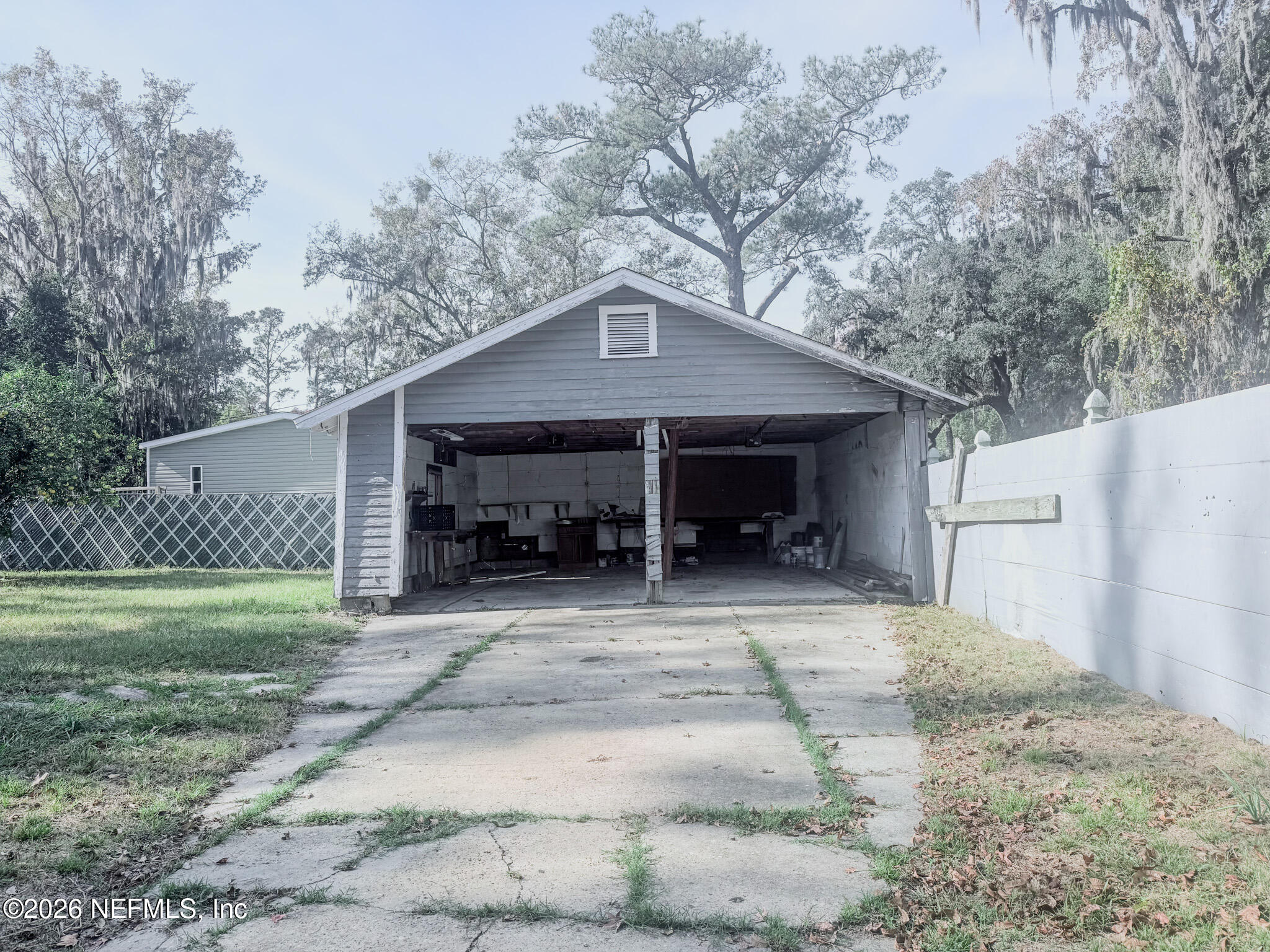 10728 Old Kings Road Jacksonville, FL 32219 - Photo 18 of 21 a house view with a outdoor space