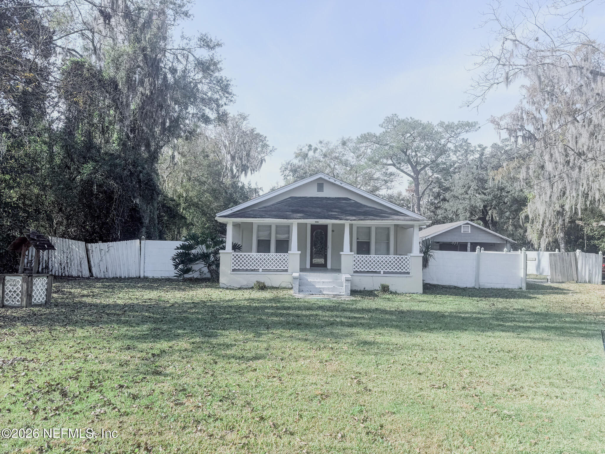 10728 Old Kings Road Jacksonville, FL 32219 - Photo 3 of 21 a view of a house with a yard