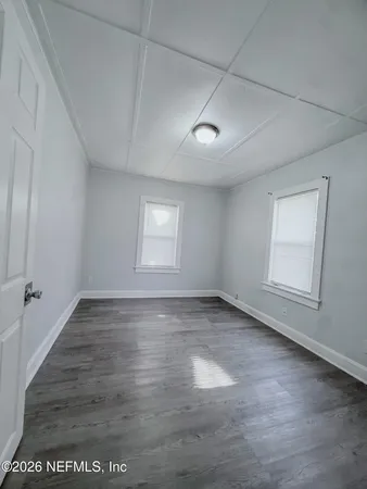 a view of outdoor space with swimming pool and green space