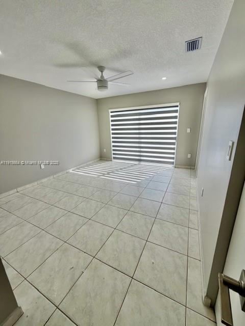 9108 Northwest 190th Terrace Hialeah, FL 33018 - Photo 2 of 10 a view of a livingroom with a window