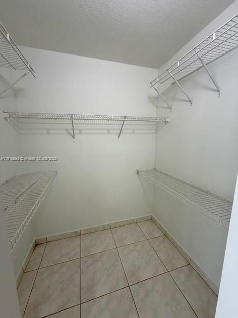 9108 Northwest 190th Terrace Hialeah, FL 33018 - Photo 6 of 10 a view of a room with racks on the wall