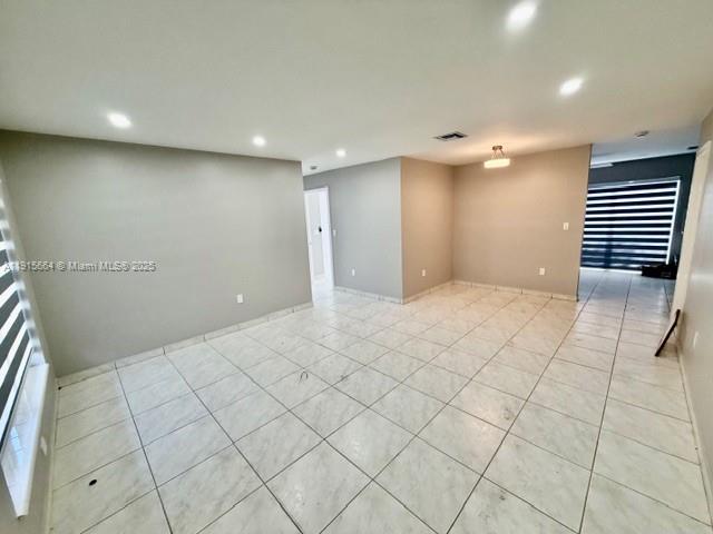 9108 Northwest 190th Terrace Hialeah, FL 33018 - Photo 8 of 10 a view of an empty room