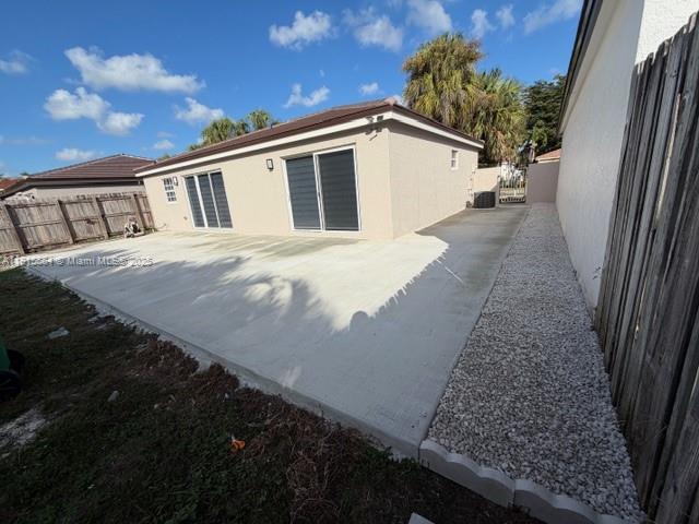 9108 Northwest 190th Terrace Hialeah, FL 33018 - Photo 10 of 10 a view of a house with backyard