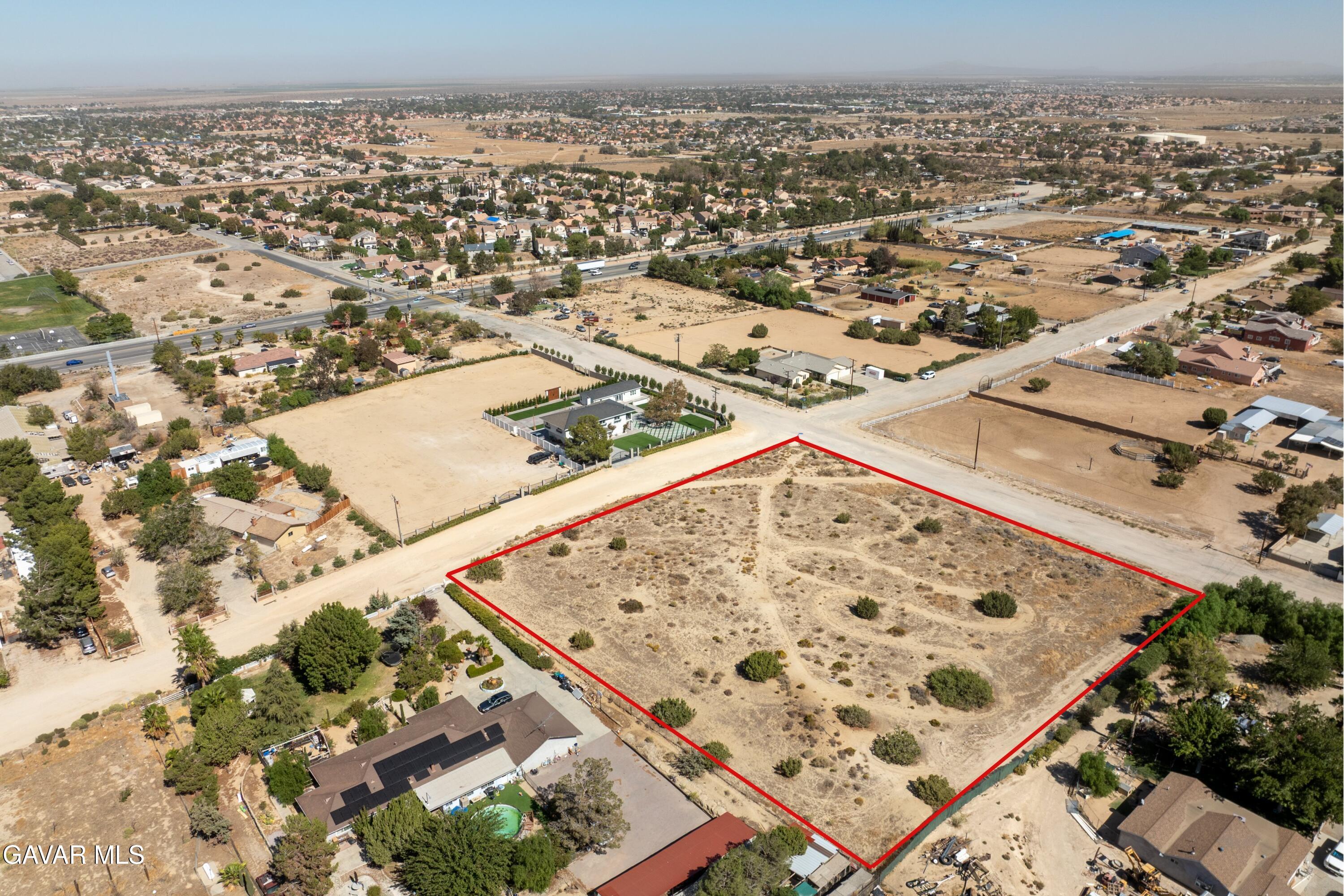 T2 37th Palmdale, CA 93550 - Photo 5 of 9 an aerial view of a large buildings and trees