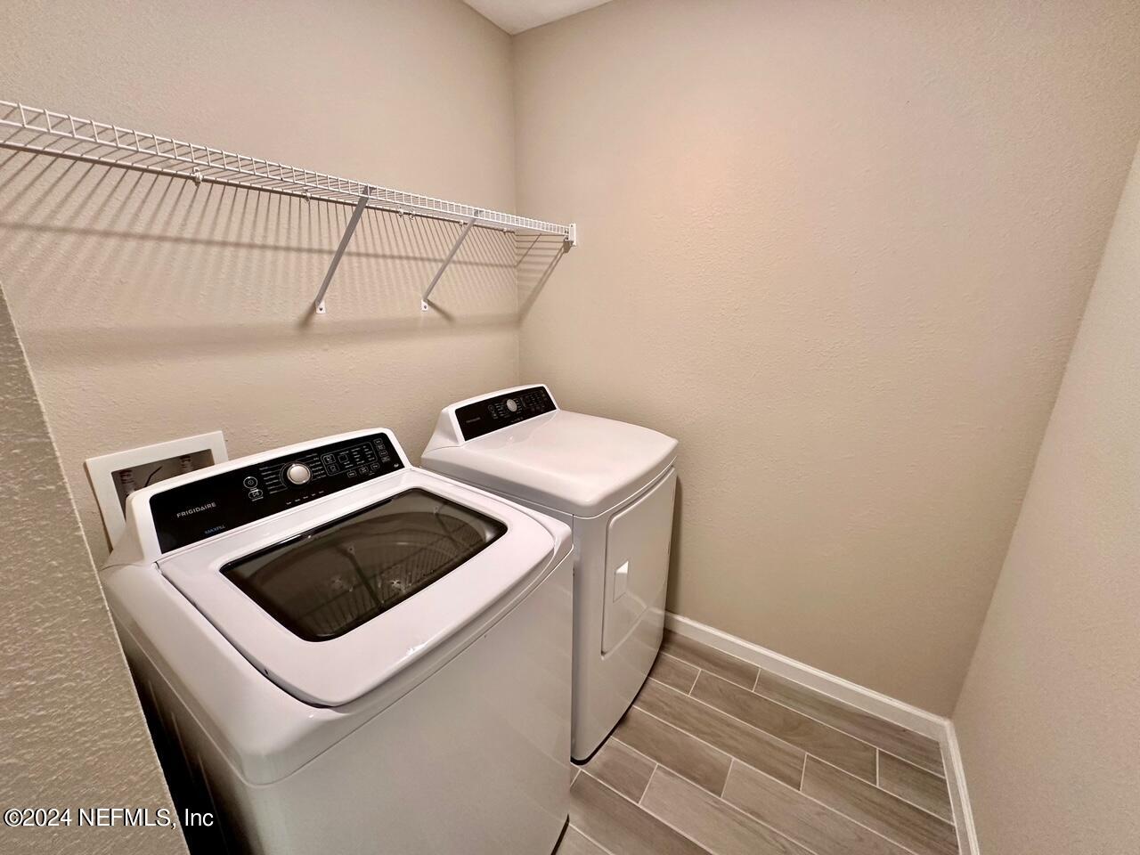 435 Boracay Circle St. Johns, FL 32259 - Photo 19 of 31 a utility room with dryer and washer
