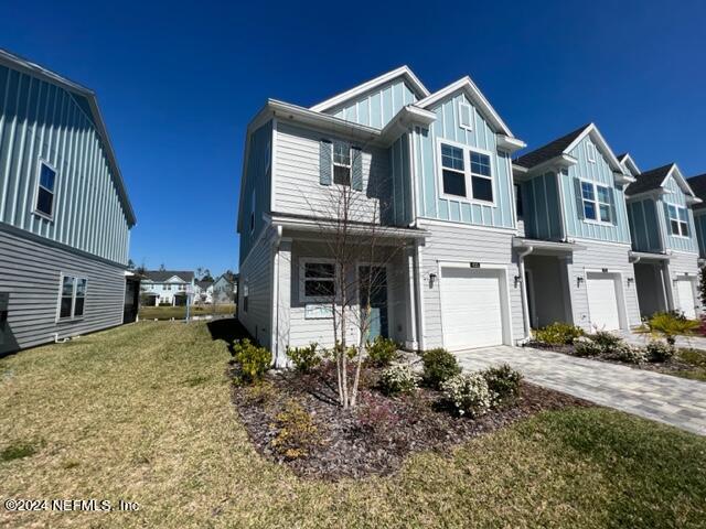 435 Boracay Circle St. Johns, FL 32259 - Photo 2 of 31 a front view of a house with a yard